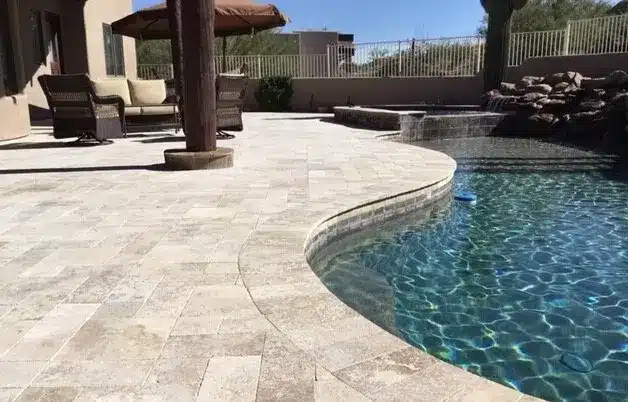 Various pavers, travertine, and stone materials for landscaping and construction projects